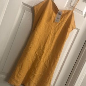 Linen dress by Abercrombie. It’s really cute color mustard yellow.